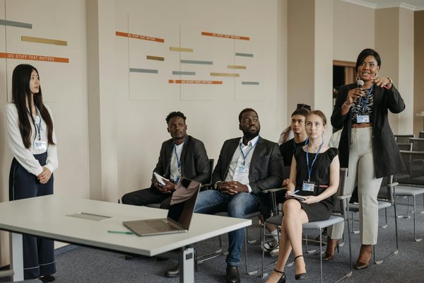 What are the key factors in choosing a business location in the UK?